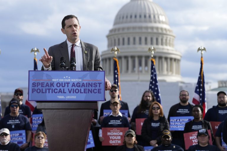 Rep. Jason Crow, D-Colo., who was in the U.S. Capitol during the January 6 attack two years ago, speaks at a rally in Washington, Thursday, Jan. 5, 2023. 