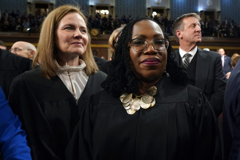 Supreme Court Justice Amy Coney Barrett and Justice Ketanji Brown Jackson watch after President Joe Biden delivered the State of the Union address to a joint session of Congress at the Capitol, Tuesday, Feb. 7, 2023, in Washington.