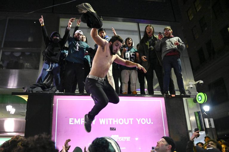 Philadelphia Eagles supporters react to the Super Bowl 57 NFL football game between the Kansas City Chiefs and the Eagles, Sunday, Feb. 12, 2023, in Philadelphia. The Chiefs won 38-35. 