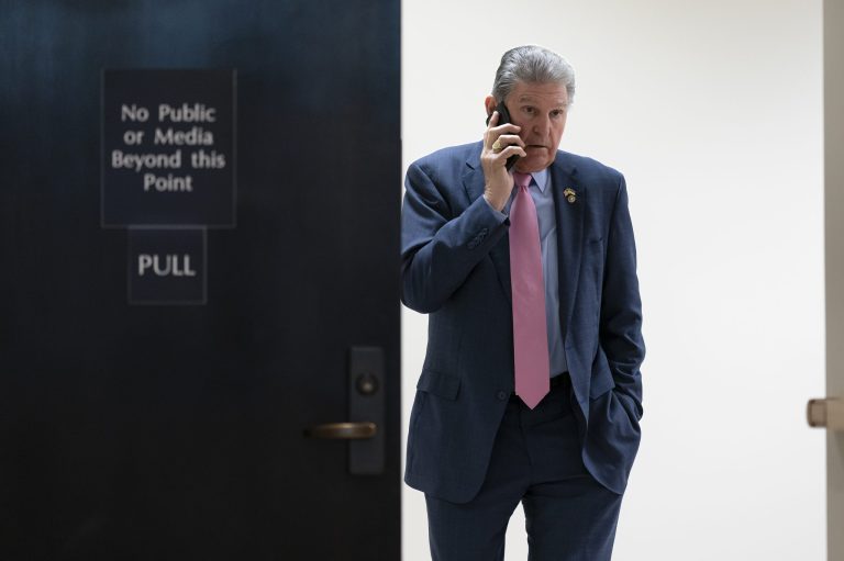 Sen. Joe Manchin pauses before leaving an intelligence briefing on the unknown aerial objects the U.S. military shot down this weekend at the Capitol in Washington, Tuesday, Feb. 14, 2023. 