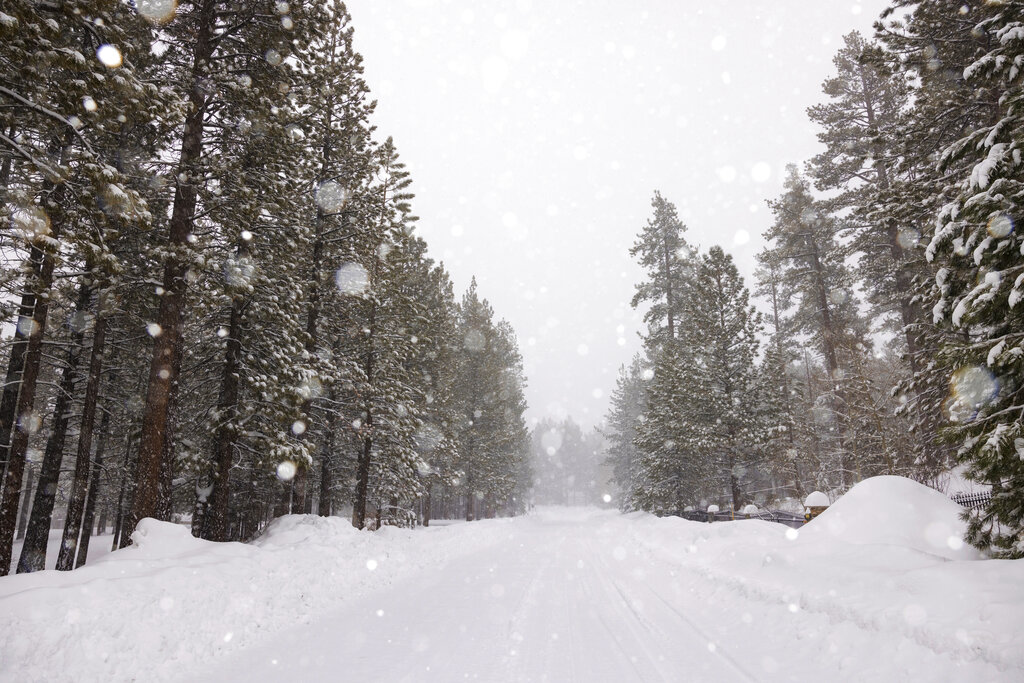 Michigan power line work continues, California gets breather