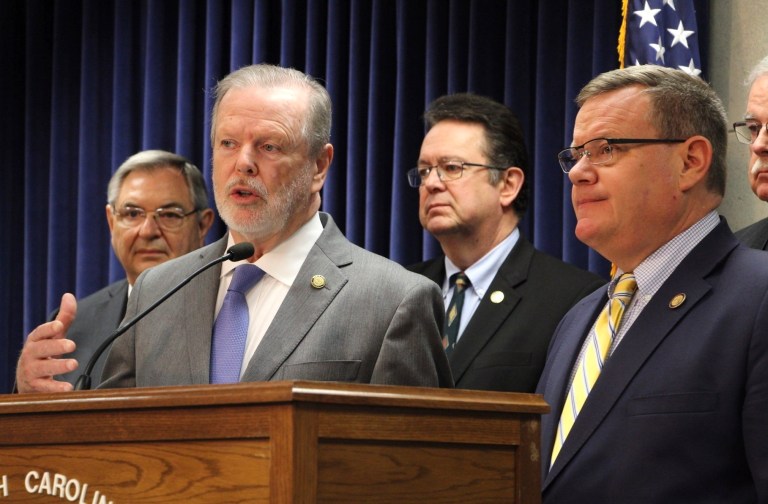 North Carolina Senate leader Phil Berger, left, speaks alongside House Speaker Tim Moore at a news conference about a Medicaid expansion agreement, Thursday, March 2, 2023, at the Legislative Building in Raleigh, N.C. 