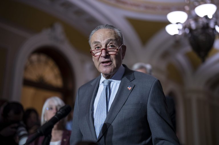 Senate Majority Leader Chuck Schumer (D-N.Y.) speaks to reporters following a closed-door policy meeting, at the Capitol in Washington, Tuesday, March 7, 2023.