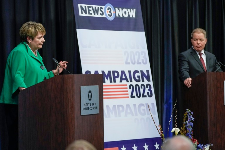 Wisconsin Supreme Court candidates Republican-backed Dan Kelly and Democratic-supported Janet Protasiewicz participate in a debate Tuesday, March 21, 2023, in Madison, Wisconsin. 