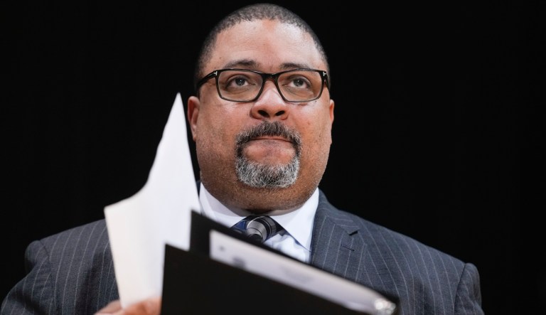 Manhattan District Attorney Alvin Bragg listens at news conference in New York, Feb. 7, 2023.