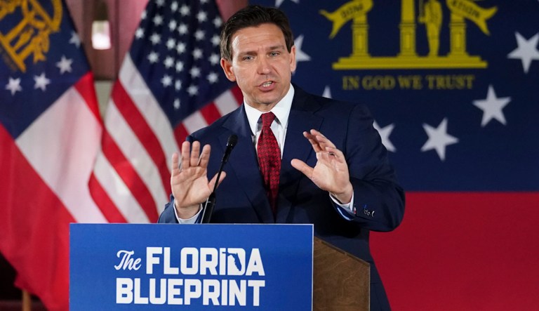 FILE - Florida Gov. Ron DeSantis speaks to a crowd at Adventure Outdoors gun store, Thursday, March 30, 2023, in Smyrna, Ga.