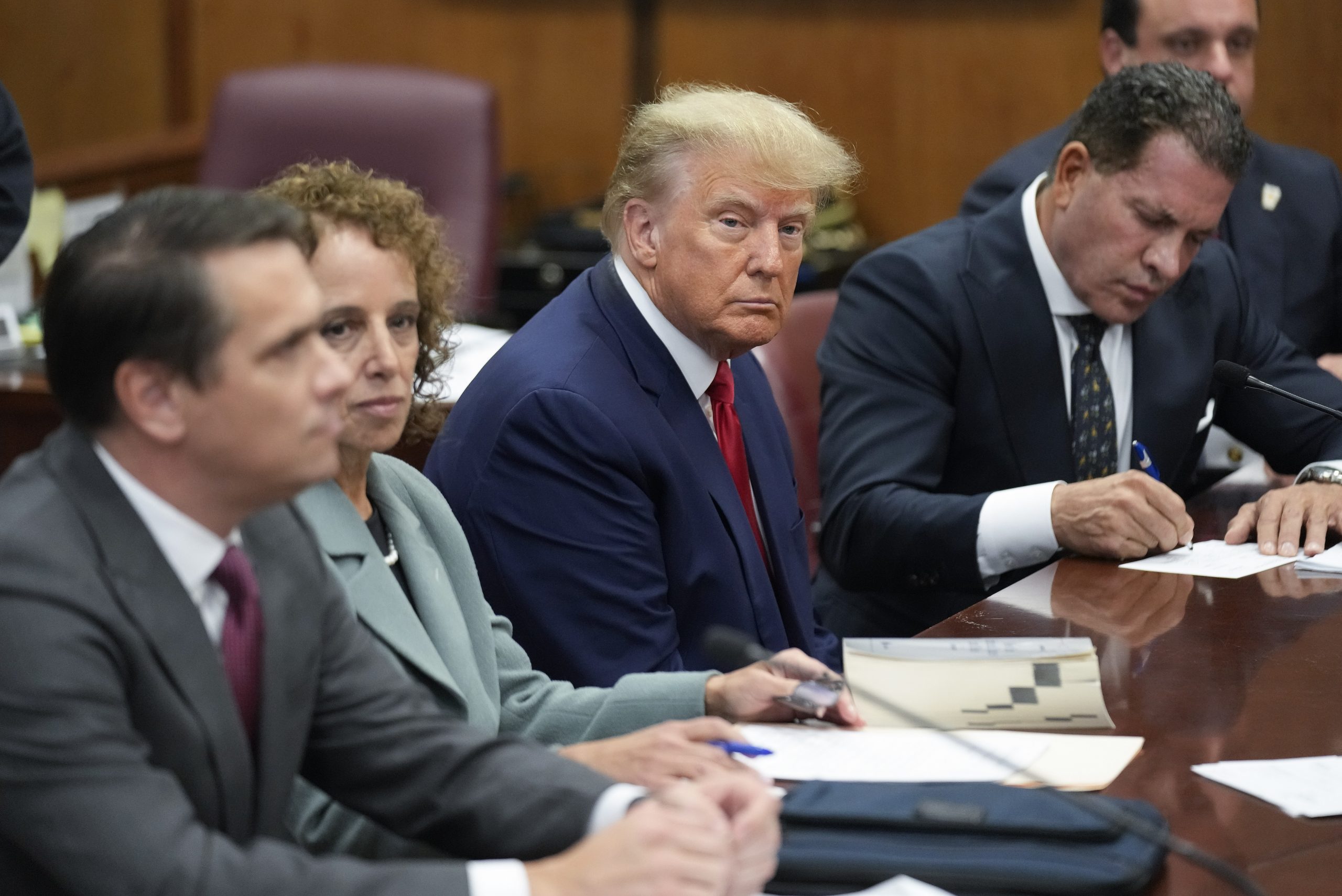 SEE IT: The extraordinary moment Trump surrenders himself to authorities