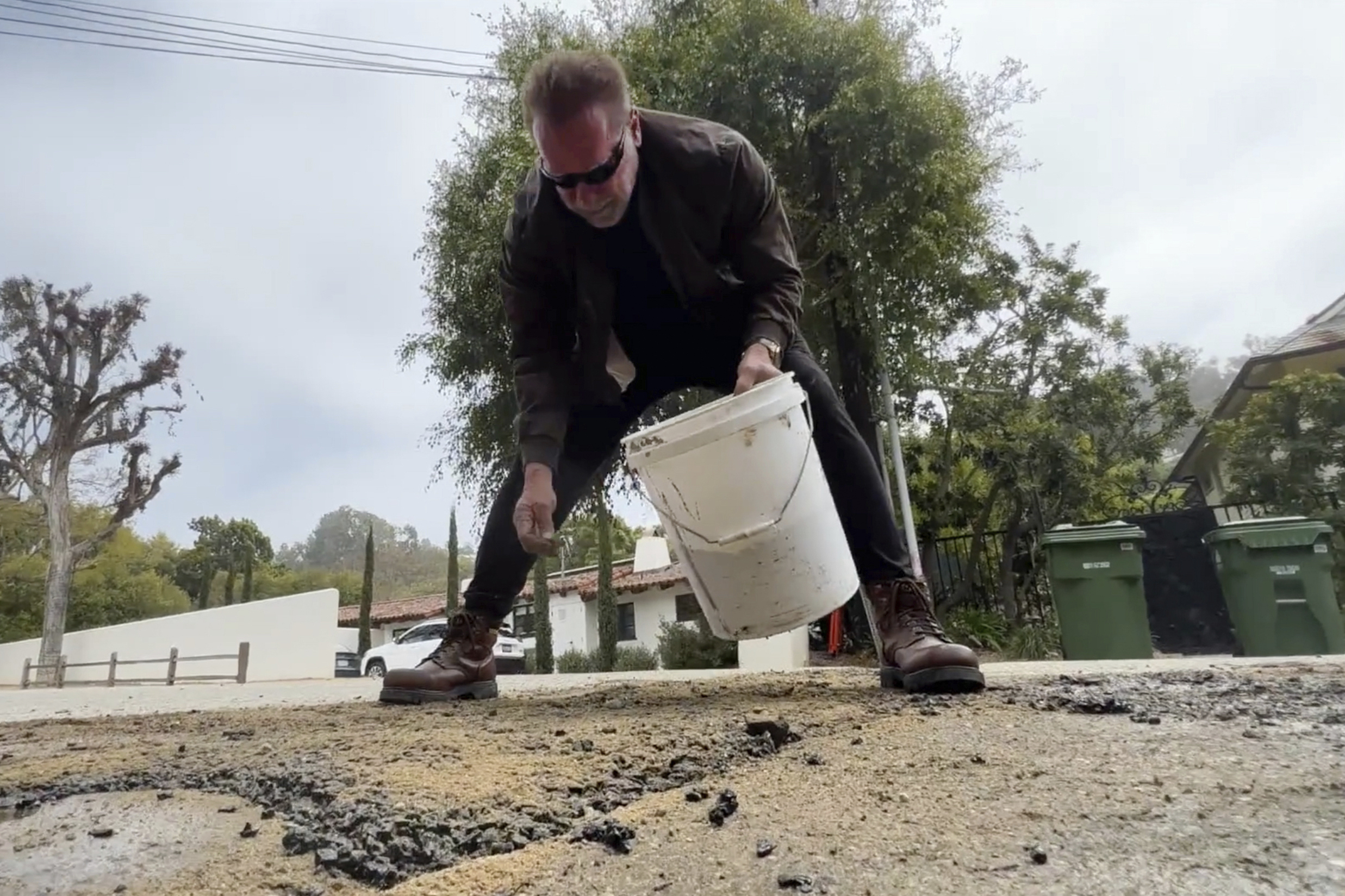 WATCH: Arnold Schwarzenegger fills pothole haunting LA neighborhood