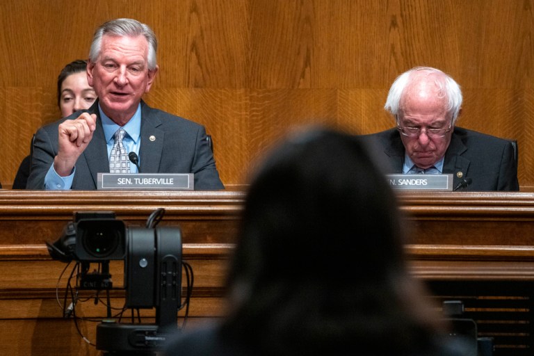 Sen. Tommy Tuberville, R-Ala., left, speaks with Chairman Bernie Sanders, I-Vt., at right, during a Senate Health, Education, Labor and Pensions confirmation hearing for Julie Su to be the Labor Secretary, on Capitol Hill, Thursday, April 20, 2023, in Washington. 