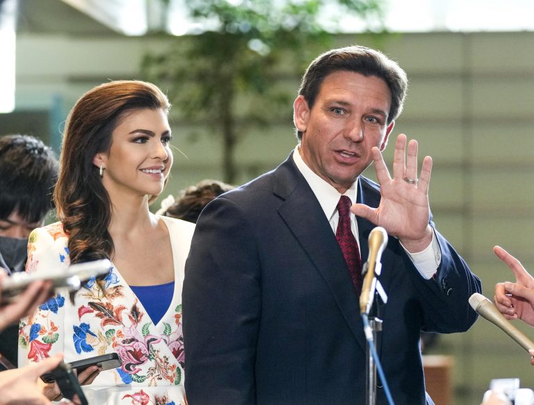 Florida Gov. Ron DeSantis, right, bids farewell to journalists as he closes talks with journalists after meeting Japanese Prime Minister Fumio Kishida at the latter's official residence in Tokyo, April 24, 2023.