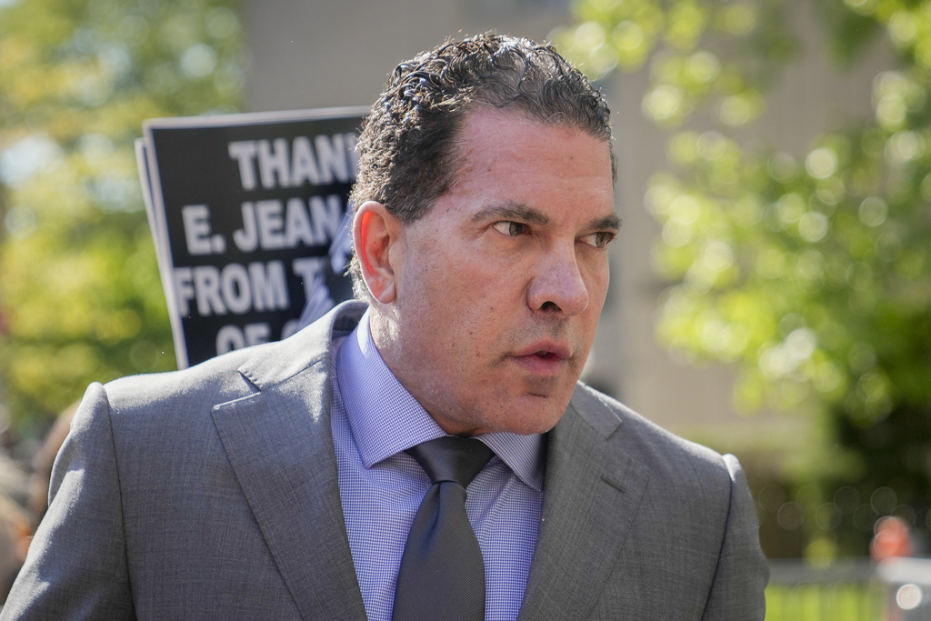 Trump Columnist Lawsuit