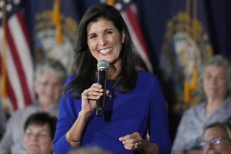 FILE - Republican presidential candidate Nikki Haley smiles while taking a question from the audience during a campaign gathering, May 24, 2023, in Bedford, N.H.