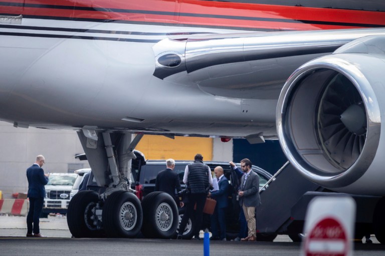 Walt Nauta, with papers and briefcase, a personal aide to former President Donald Trump arrives to board Trump's plane at Newark International Airport on Saturday, June 10, 2023, in Newark, N.J. 