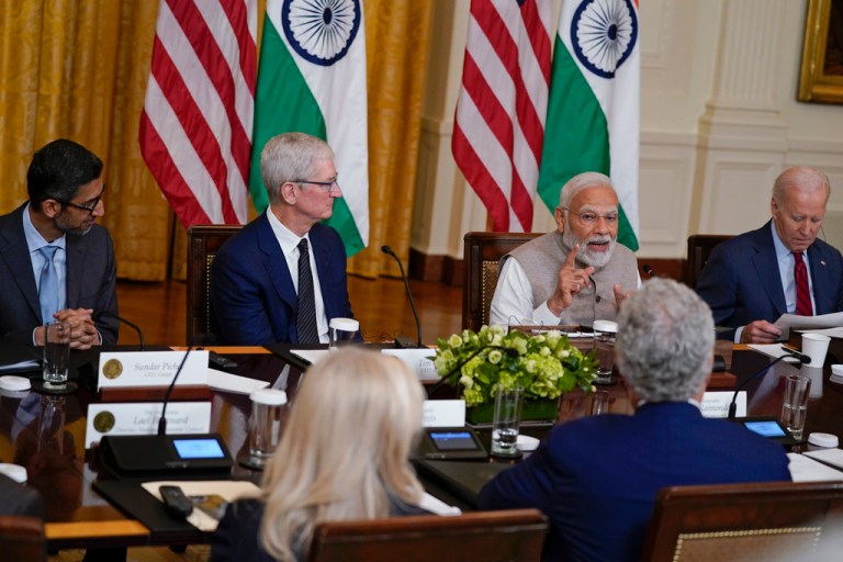India's Prime Minister Narendra Modi speaks during a meeting with President Joe Biden and American and Indian business leaders in the East Room of the White House, Friday, June 23, 2023, in Washington. From left, Sundar Pichai, CEO of Google, Tim Cook, CEO of Apple, Modi, and Biden.