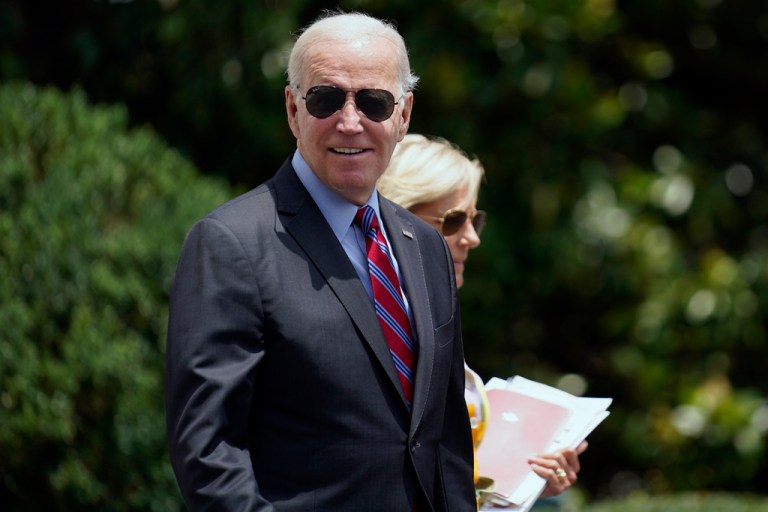 President Joe Biden walks with first lady Jill Biden to board Marine One on the South Lawn of the White House in Washington, Friday, July 14, 2023, as they head to Camp David for the weekend.