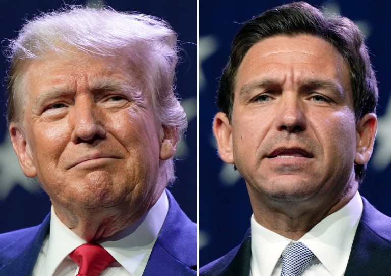 This combination of photos shows Republican presidential candidates former President Donald Trump, left, and Florida Gov. Ron DeSantis at the Republican Party of Iowa's 2023 Lincoln Dinner in Des Moines, Iowa, on July 28, 2023. 