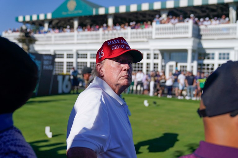 Former President Donald Trump looks over the crowd during the final round of the Bedminster Invitational LIV Golf tournament in Bedminster, N.J., Sunday, Aug. 13, 2023.