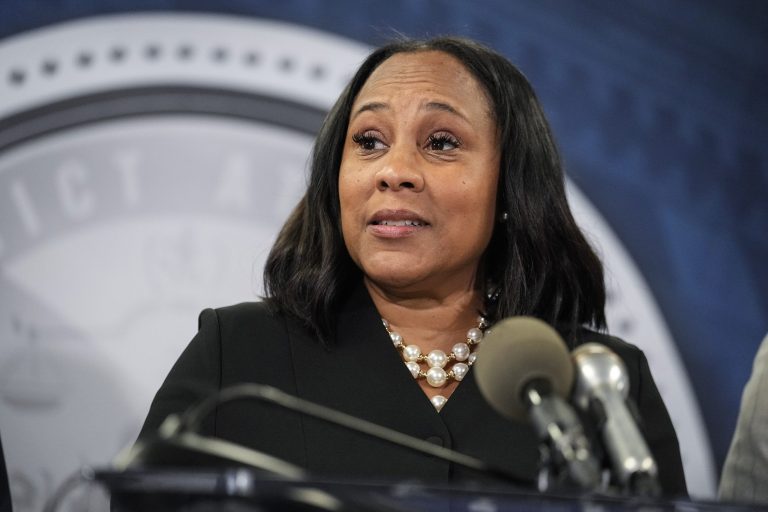 Fulton County District Attorney Fani Willis speaks in the Fulton County Government Center during a news conference on Monday, Aug. 14, 2023, in Atlanta. Donald Trump and several allies have been indicted in Georgia over efforts to overturn his 2020 election loss in the state.