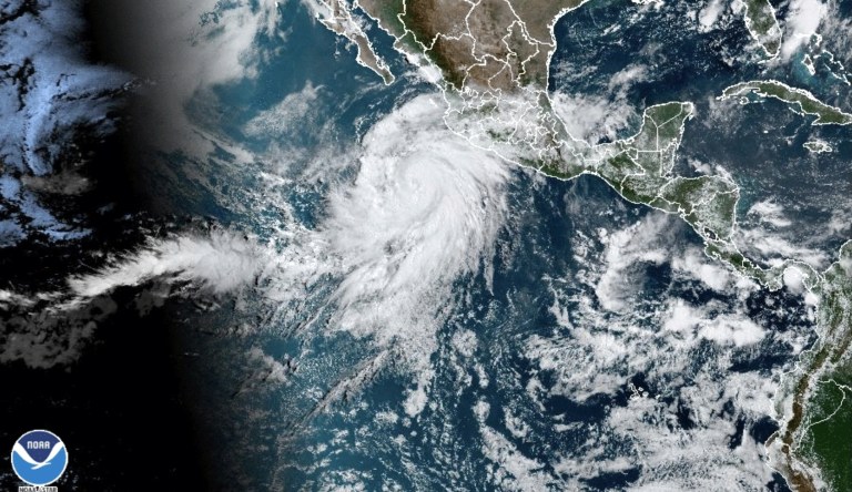 This satellite image taken at 10:50am EDT on Thursday, Aug. 17, 2023, and provided by the National Oceanic and Atmospheric Administration shows Hurricane Hilary off the Pacific coast of Mexico. 