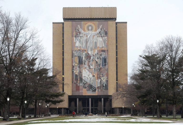 This mural, often times referred to as "Touchdown Jesus," is on the front of the Hesburgh Library at the University of Notre Dame in South Bend, Ind. The university is being urged to forgo taking some $6 million in stimulus money because it has a $13 billion endowment.