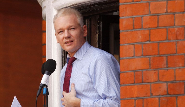 This is a Sunday, Aug. 19, 2012 file photo of  WikiLeaks founder Julian Assange as he  makes a statement to the media and supporters at a window of Ecuadorian Embassy in central London.
