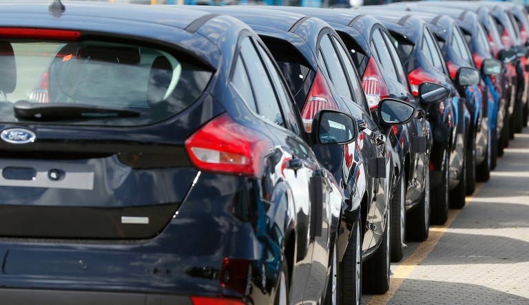 FILE - In this Friday, July 21, 2017, file photo, Ford cars wait for deployment after arrival by ship at the Ford Dagenham diesel engine plant in London. 