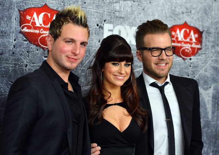 LAS VEGAS, NV - DECEMBER 10:  (L-R) Mike Gossin, Rachel Reinert and Tom Gossin of Gloriana arrive at the 2012 American Country Awards at the Mandalay Bay Events Center on December 10, 2012 in Las Vegas, Nevada.  (Photo by Frazer Harrison/Getty Images)