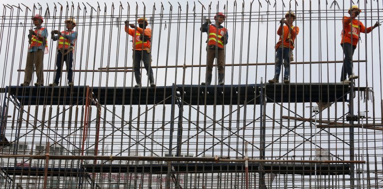 Trump said he would make an announcement about wages paid by contractors, but nobody knows what it could be.(AP Photo/Sakchai Lalit)