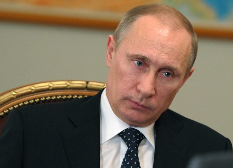 FILE - This Feb. 28, 2014 file-pool, photo shows Russian President Vladimir Putin listens  during his working meetings at the Novo-Ogaryovo residence outside Moscow, Russia. Tensions mounting, the U.S. and European allies struggle over whether threatened international penalties are enough to deter Russia from overtaking the strategic Crimean peninsula. Secretary of State John Kerry heads to Kiev in a diplomatic show of support for Ukraine but critics say it's too little, too late. European leaders are concerned about Russia's supplies of natural gas for their countries.  (AP Photo/RIA-Novosti Presidential Press Service, Alexei Nikolsky, File-Pool)