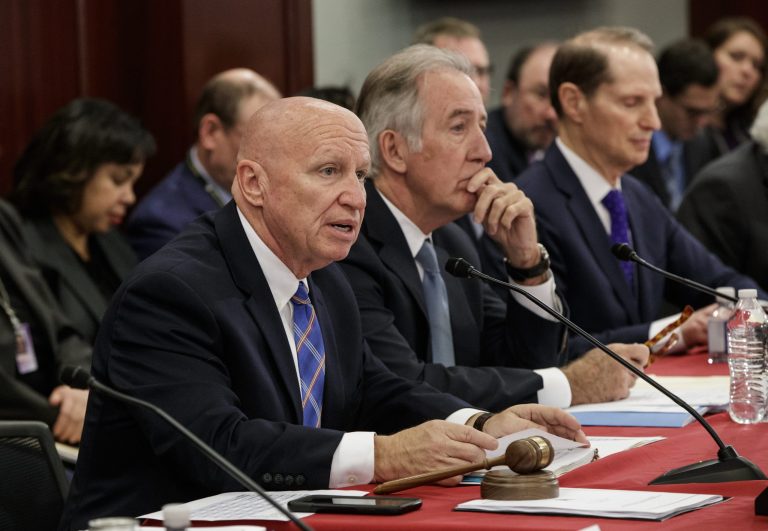 From left, House Ways and Means Committee Chairman Kevin Brady, R-Texas, Rep. Richard Neal, D-Mass., ranking member of the House Ways and Means Committee, and Sen. Ron Wyden, D-Ore., the top Democrat on the Senate Finance Committee, and other tax conferees gather to work on the sweeping overhaul of the nation's tax laws, on Capitol Hill in Washington, Wednesday, Dec. 13, 2017. (AP Photo/J. Scott Applewhite)