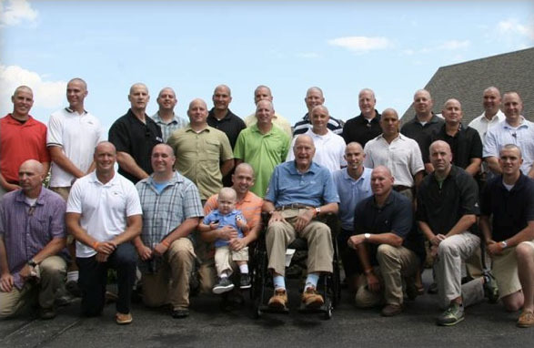 Former President George H.W. Bush and with his Secret Service detail have shaved their heads to show solidarity with the 2-year-old son of a Secret Service agent with leukemia.