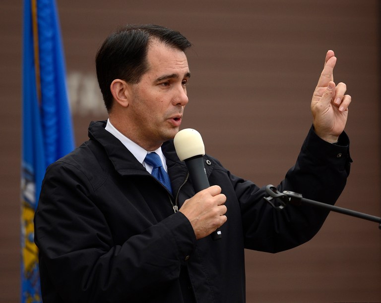 In a new poll, Wisconsin Gov. Scott Walker leads Mary Burke by seven points among likely voters.Â (AP Photo/Green Bay Press-Gazette, Evan Siegle)Â 