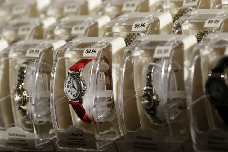 FILE - In this Thursday, Nov. 28, 2013, file photo, watches are on display at Kmart in New York. The government reports on consumer prices for November on Tuesday, Dec. 17, 2013. (AP Photo/Julio Cortez, File)
