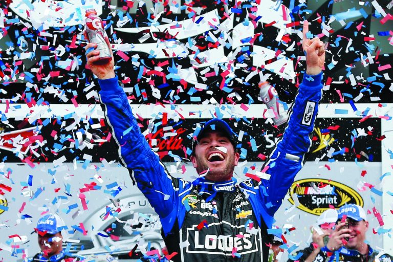 Chris Graythen/Getty Images
Five-time Sprint Cup champ Jimmie Johnson pulled away after a restart to claim his second Daytona 500 victory and first since 2006.