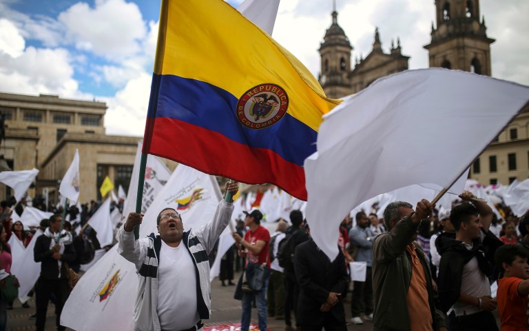 Colombia's Congress approved the revised peace accord between the government and the Revolutionary Armed Forces of Colombia on Wednesday night, according to multiple reports. (AP Photo/Ivan Valencia)