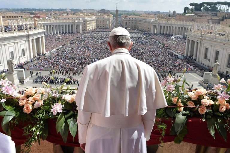 Pope Francis addresses the crowd prior to delivering his Urbi et Orbi (to the city and to the world) message from the main balcony of St. Peter's Basilica, at the Vatican, Sunday, April 16, 2017. (L'Osservatore Romano/Pool Photo via AP)