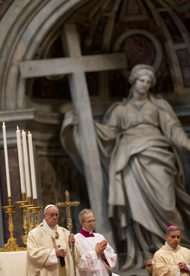 Pope Francis holds the pastoral staff as he presides over a Mass for the ordination of Monsignor Peter Brian Wells and Monsignor Miguel Angel Ayuso Guixot, in St. Peter's Basilica at the Vatican, Saturday, March 19, 2016. (AP Photo/Alessandra Tarantino)