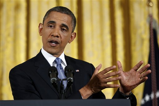 President Barack Obama gestures as he answers a question during a news conference in the East Room of the White House in Washington Wednesday, Nov. 14, 2012. (AP Photo/Carolyn Kaster)