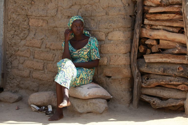 Hadiza Fali, one of the school girls that escaped being kidnapped by Islamist extremists by jumping off a truck, is photographed outside her home, in Chibok, Nigeria. More than 200 schoolgirls were kidnapped from a school in Chibok in Nigeria's north-eastern state of Borno on April 14. Boko Haram claimed responsibility for the act. (AP Photo/Sunday Alamba)