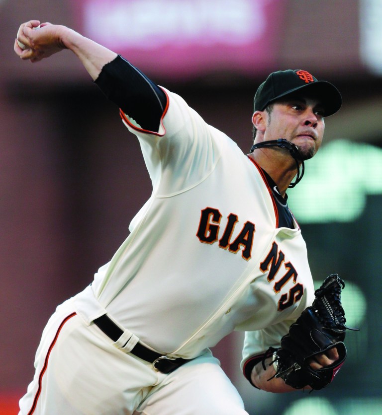 Paul Kitagaki Jr./AP/The Sacramento Bee
San Francisco Giants second baseman Marco Scutaro was taken out by St. Louis Cardinals' Matt Holliday during Game 2 of the NLCS on Monday.