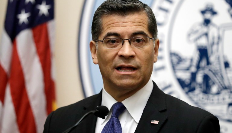 California Attorney General Xavier Becerra announced the lawsuit. He said Maine, Maryland and Minnesota will join the lawsuit. (AP Photo/Marcio Jose Sanchez)