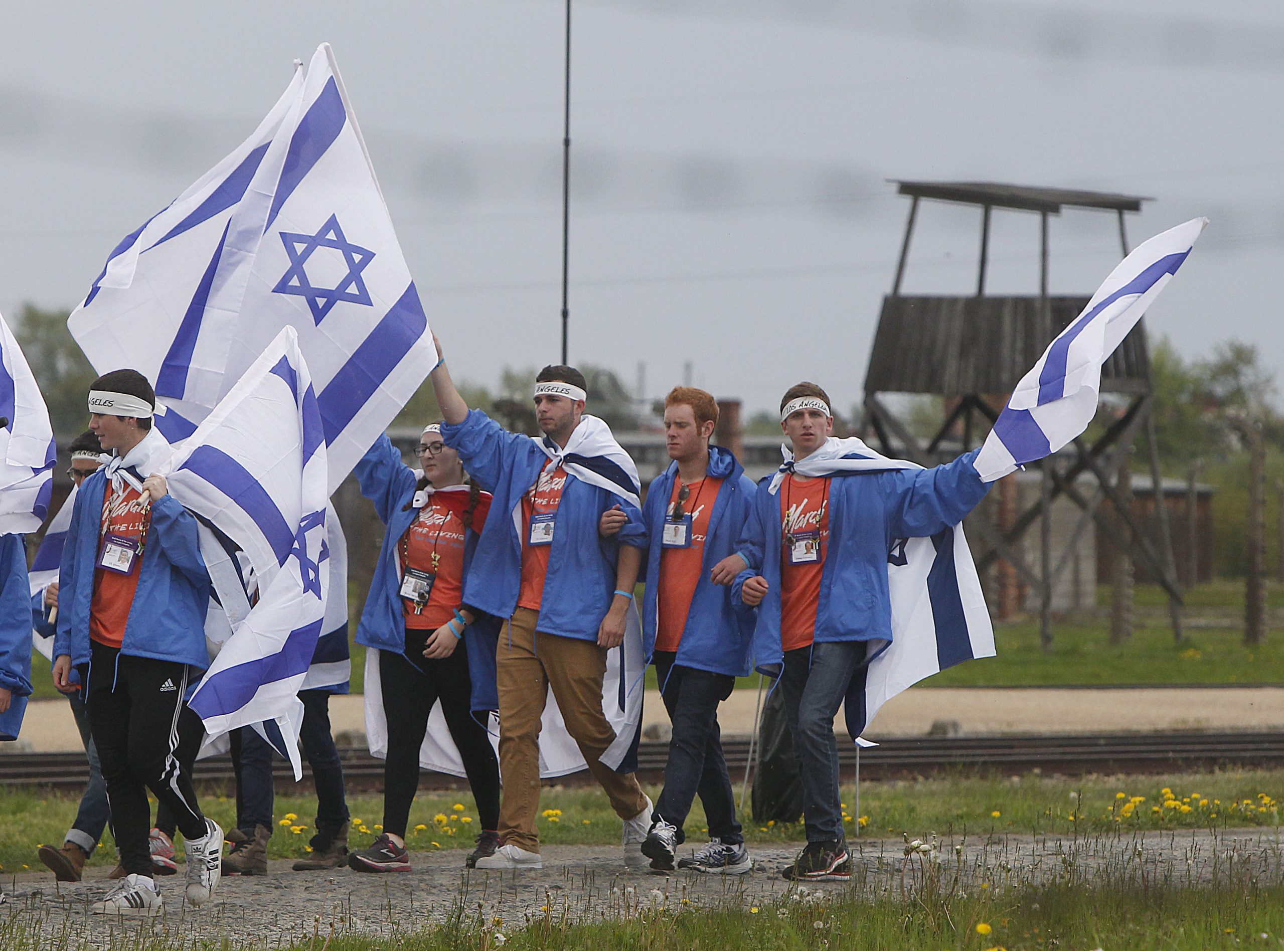 Young Jews in Auschwitz memorial march
