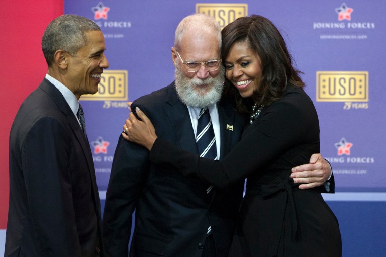 David Letterman's job at the USO event, where he appeared with President Obama and first lady Michelle Obama, was to introduce the cake, which he described as 