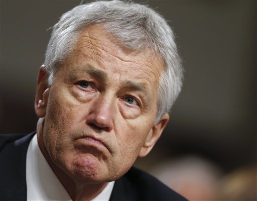FILE - In this Jan. 31, 2013 file photo, former Nebraska Sen. Chuck Hagel testifies on Capitol Hill in Washington before the Senate Armed Services Committee's confirmation hearing. Senate Minority Leader Mitch McConnell of Ky. is raising the possibility of a filibuster of  Hagel to be defense secretary. (AP Photo/J. Scott Applewhite, File)