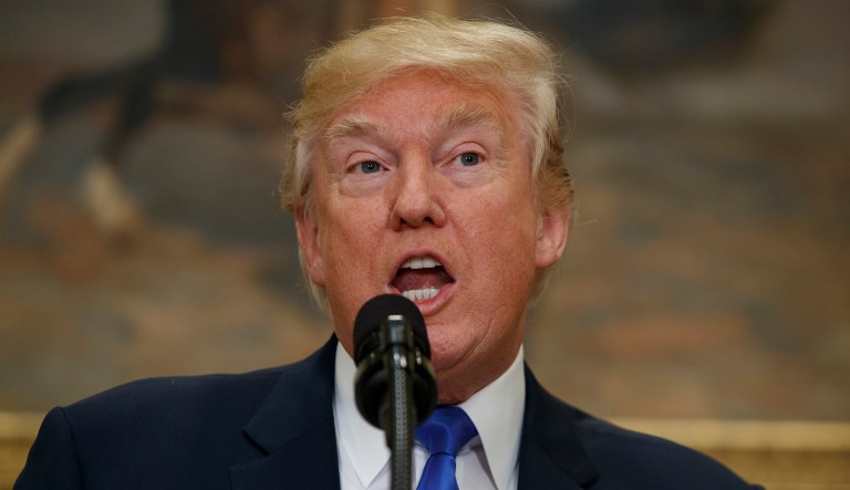 Trump openly questioned the constitutionality of a new sanctions bill that he signed into law. (AP Photo/Evan Vucci)