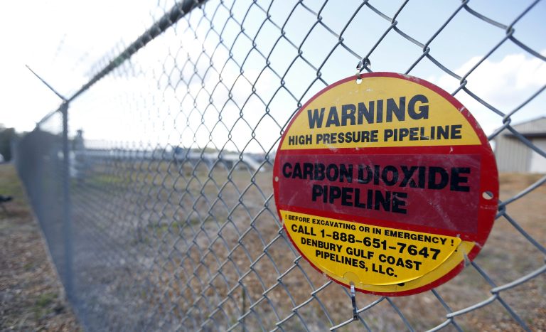One of several warning signs line the secured at Denbury Resources Inc.'s, Tinsley Field facility in Tinsley, Miss. (AP/Rogelio V. Solis)