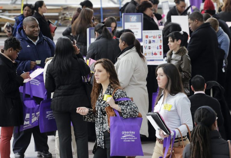 FILE - In this March 14, 2013, file photo, a crowd of job seekers attends a health care job fair in New York. Almost 6 million young people, ages 16 to 24, are neither in school nor working, according to a study released Monday, Oct. 21, 2013, by The Opportunity Nation coalition. The study also finds that 49 states have seen an increase in the number of families living in poverty and 45 states have seen household median incomes fall in the last year. The dour report underscores the challenges young adults face now and foretell challenges they are likely to face as they get older.  (AP Photo/Mark Lennihan, File)