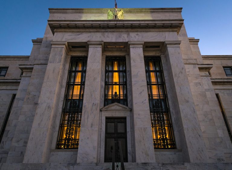 FILE - This Sept. 18, 2013 file photo shows the Federal Reserve headquarters in Washington. Minutes of the Fed's discussion at its July 29-30, 2014 meeting show that some officials thought the economy was improving enough that the Fed would need 