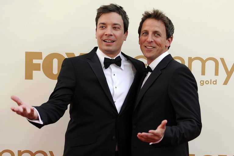 FILE This Sept. 18, 2011 file photo shows Jimmy Fallon, left, and Seth Meyers at the 63rd Primetime Emmy Awards in Los Angeles. Meyers is moving from his 