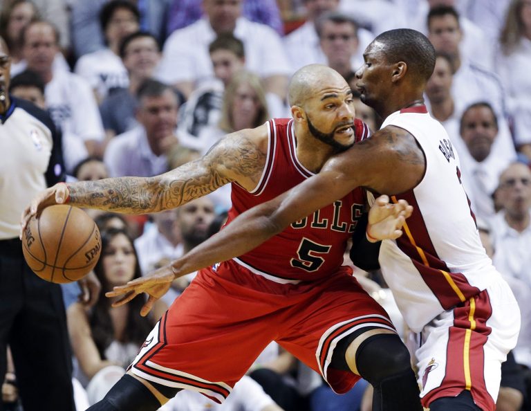 Bulls steal Game 1, top Heat 93-86